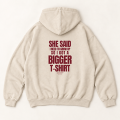 She said i need to grow up so i got a bigger t-shirt hoodie — Sandshell, back print
