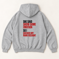 She said show some emotion so i checked my bank account hoodie — Heather Grey, back print