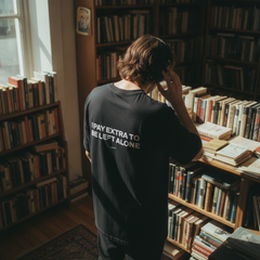 I pay extra to be left alone t-shirt — Black, lifestyle photo
