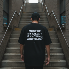Most of my talent is knowing who to ask t-shirt — Black, lifestyle photo