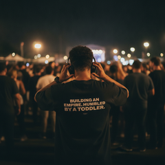 Building an empire. humbled by a toddler t-shirt — Black, lifestyle photo